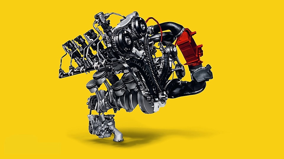 Turboladdad motor med luftkompressor på gul bakgrund